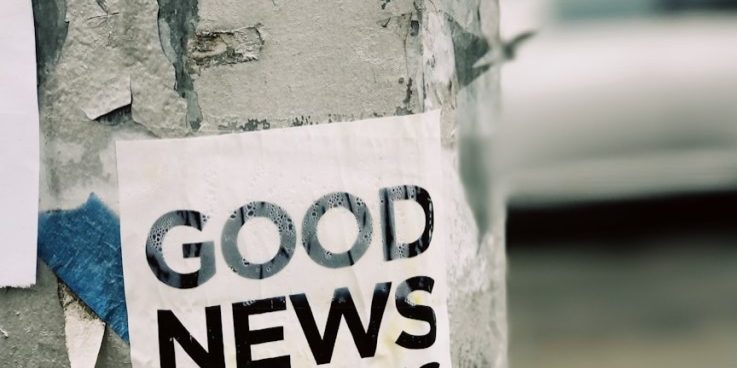 photo by jon tyson white Good News Is Coming paper on wall